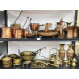 A collection of copper and brassware items.