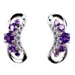 A pair of 925 silver earrings set with amethyst and white stones, L. 1.9cm.