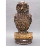 A large composition owl figure (possibly a table lamp base), H. 57cm.