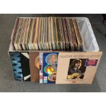 A crate of approx. 150 pop rock and chart LP records.