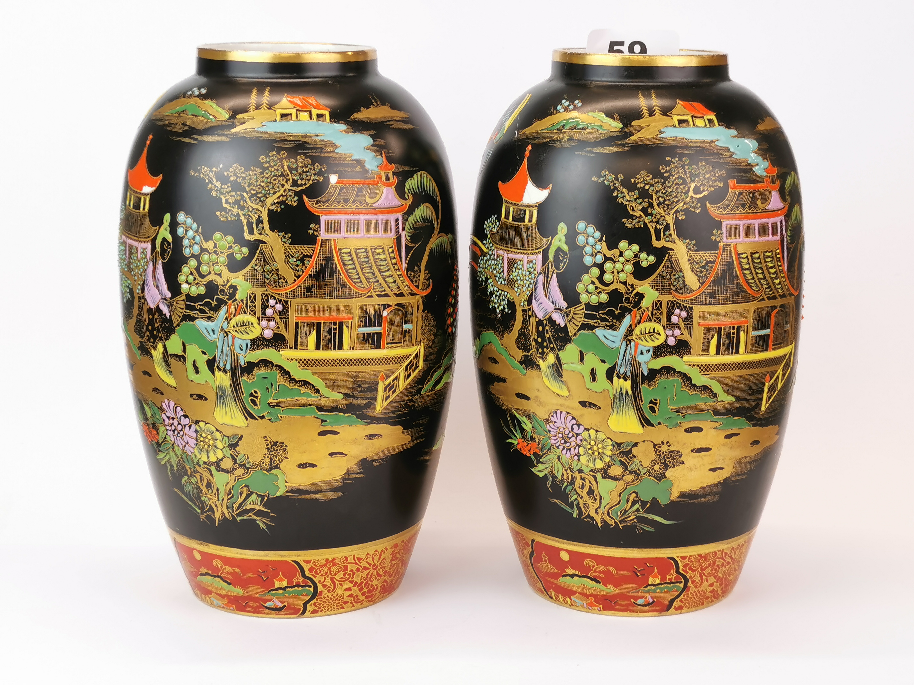 A pair of Carlton ware Oriental design porcelain vases, H. 21cm.