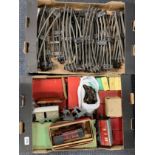 A quantity of 'O' gauge railway items, including locomotives, rolling stock and accessories.
