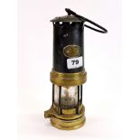 An early Welsh miner's lamp by E. Thomas & Williams Ltd of Aberdare, H. 26cm. (Glass A/F).