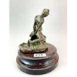 An interesting cast bronze male figure mounted on a wooden base, H. 20cm.