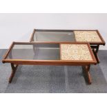 A pair of 1970's teak ceramic tile and smoked glass coffee tables, 121 x 50 x 44cm.