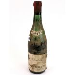 A 1923 bottle of Richebourg Negociants A Beaune red wine, bottom of lot number indicates liquid