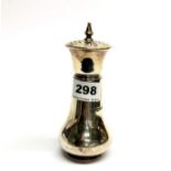 A hallmarked silver sugar shaker, H. 15cm.