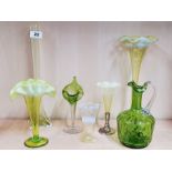 A lovely group of seven 19th century green opaline and other glass items, tallest H. 35cm.