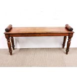 A mid 19th century mahogany bed-end stool with scroll ends, L. 106cm, H. 50cm.