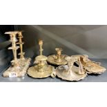 A WMF silver plated candlestick, with further candlesticks, chamber sticks and candle snuffers,