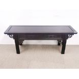 A Chinese carved hardwood low alter table, L. 110cm, H. 41cm.