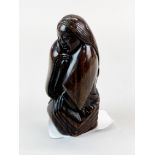 A quality carved fruitwood Netsuke of a Japanese lady with long hair wearing a kimono, with inlaid