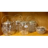 Three vintage silver plate and glass biscuit barrels and further dish.