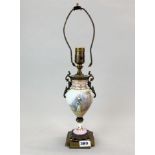 An early 20th century French Ormulu mounted porcelain table lamp, H. 47cm.