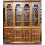 An attractive teak wood display cabinet, W. 180cm, H. 202cm.