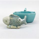 A Chinese pale blue glazed octagonal porcelain wine cup with dragon head handle, W. 11cm, with a