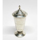 An Art Deco hallmarked silver sugar shaker, H. 17cm.