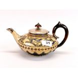 A lovely early silver (tested) mounted Doulton Lambeth teapot, W. 23cm, H. 12cm.