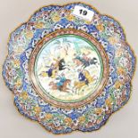 A Persian hand painted tin dish, Dia. 25cm.