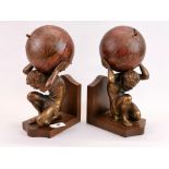 A pair of wood and gilt composition Atlas bookends, H. 27cm.