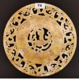 A Chinese carved archaic form jade / hardstone Pi disc carved with dragons, Dia. 28cm.