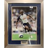 A framed autograph photograph of Jermaine DeFoe with certificate, frame size 48 x 58cm.