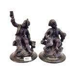 A pair of 19th century spelter figures of children on stained oak bases, H. 21cm.