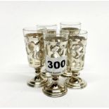 Five sterling silver and glass kiddisch cups, H. 7.5cm.