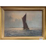 A gilt framed oil on canvas of a Thames Barge by Colin Moore, frame size 54 x 39cm.