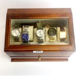 A gent's watch case and contents.