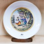 An early hand painted English porcelain plate decorated with children playing blind man's buff, Dia.