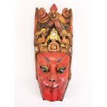 A Chinese hand painted carved wooden mask, H. 32cm.