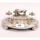 A 19th century silver plated desk stand, W. 21cm.
