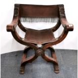 A leather upholstered Savonarola style armchair, W. 72cm.