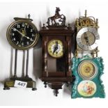 A group of four mixed clocks, one with pendulum visible behind the dial, H. 26cm.