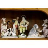 A group of Nao and other porcelain figurines, tallest H. 18cm.