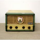 A vintage Dansett portable record player and radio tuner, 41 x 46 x 26cm.