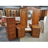 An attractive four drawer contemporary chest, dressing table and stool with matching bedside