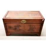 An impressive Oriental carved teak and camphor wood lined blanket chest, 103 x 53 x 60cm.