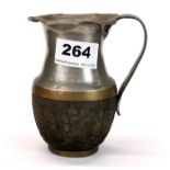 An early 20th century Chinese carved coconut, pewter and brass jug, H. 12cm.