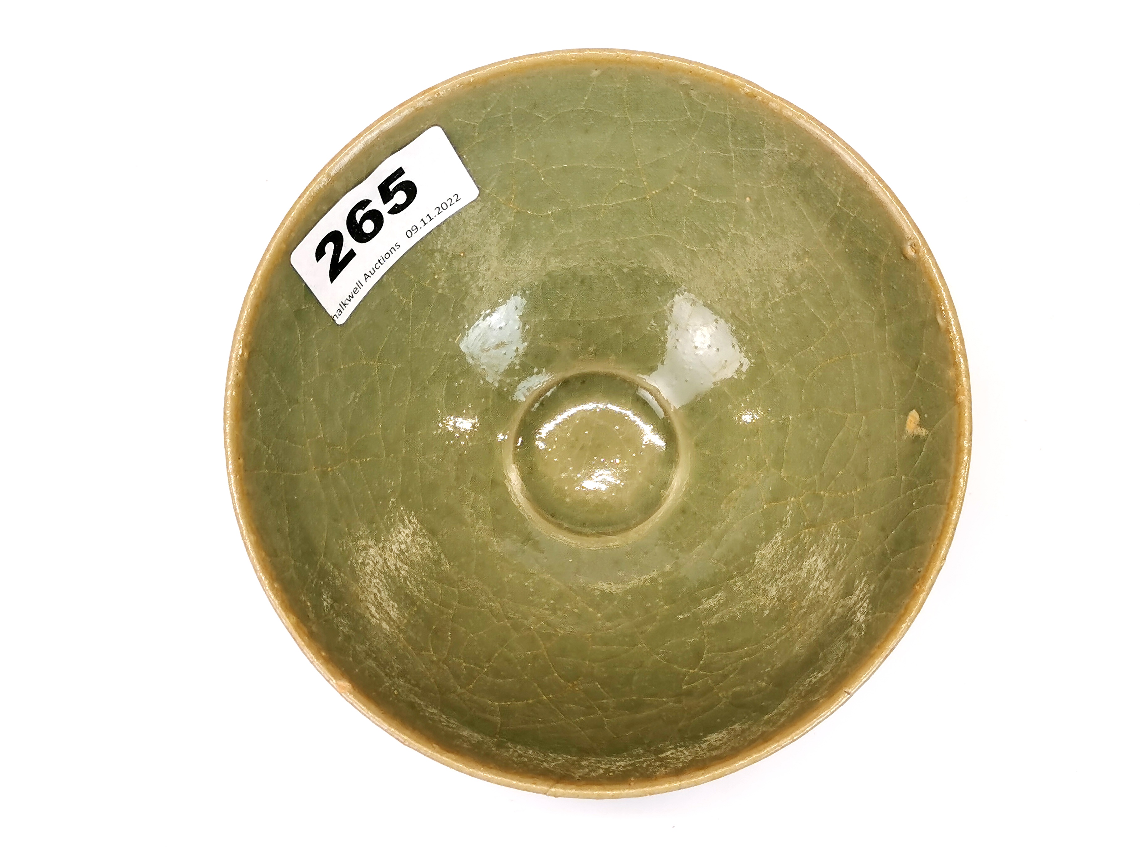 A Chinese celadon crackle glazed lotus bowl, Dia. 14cm, H. 7cm. Slightly A/F. - Image 3 of 3