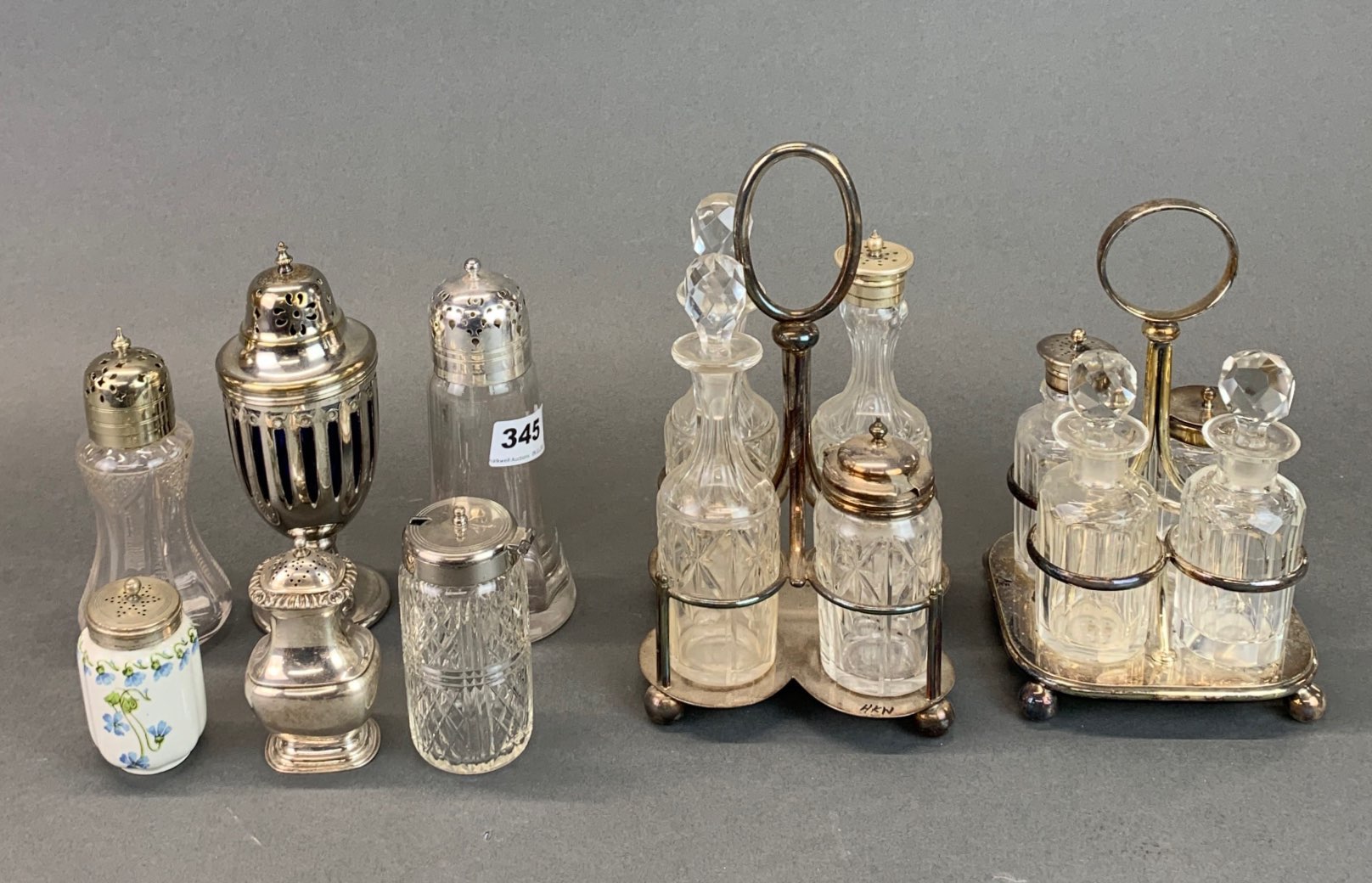 Two silver plate and cut glass cruets and other items.