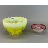 A 19th century vaseline glass fruit bowl, Dia. 22cm, H. 13cm, together with a further 19th century