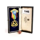 A 9ct gold Masonic signet ring and 9ct gold lodge medal.