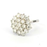 A hallmarked 18ct white gold cluster ring set with brilliant cut diamonds, approx. 1.90ct total (