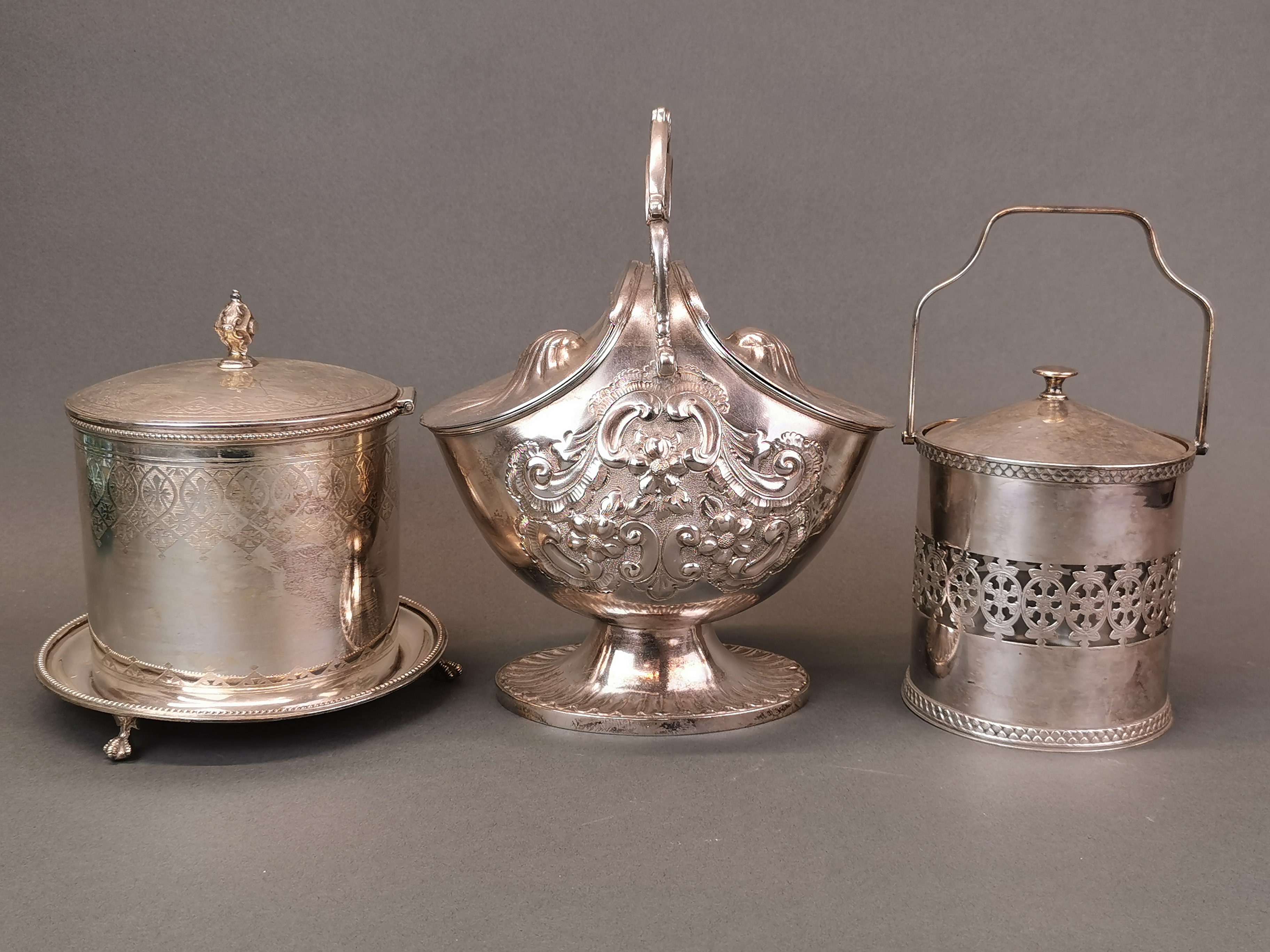 An antique silver plated double sided biscuit box, H. 25cm, together with a glass lined silver