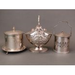 An antique silver plated double sided biscuit box, H. 25cm, together with a glass lined silver