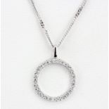 An 18ct white gold diamond set pendant on an 18ct white gold chain, L. 42cm.