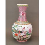 A Chinese hand enamelled Famille rose porcelain vase, H. 34cm.