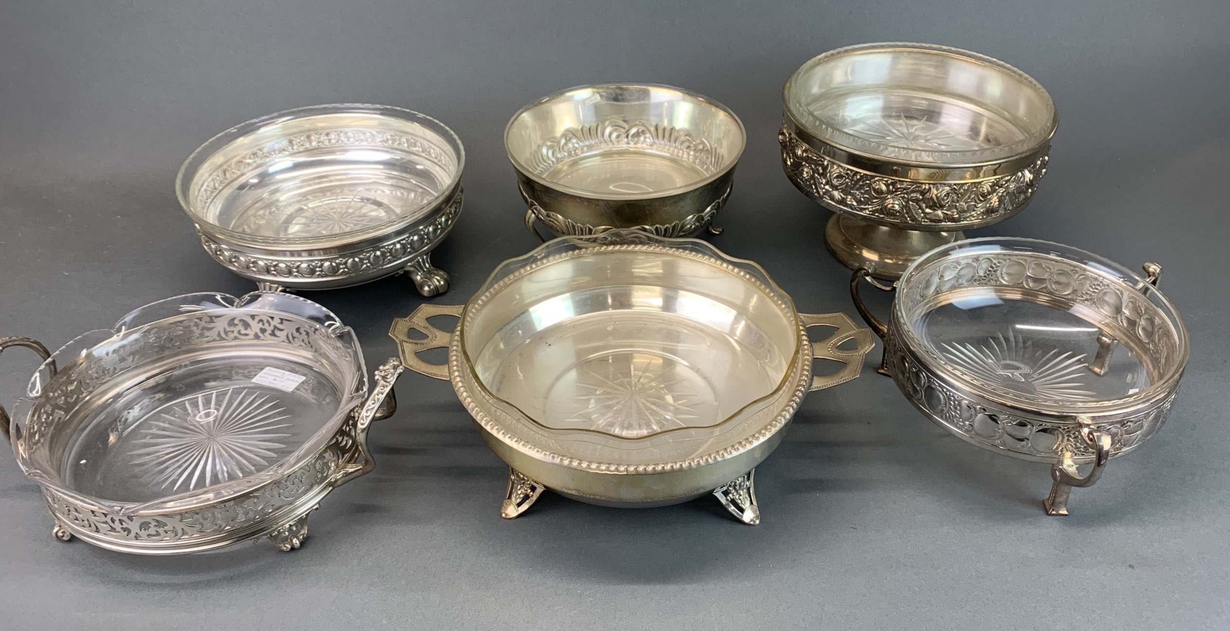 A group of good silver plate and glass fruit bowls, including Richard Martin, Ebeneezer Hall and